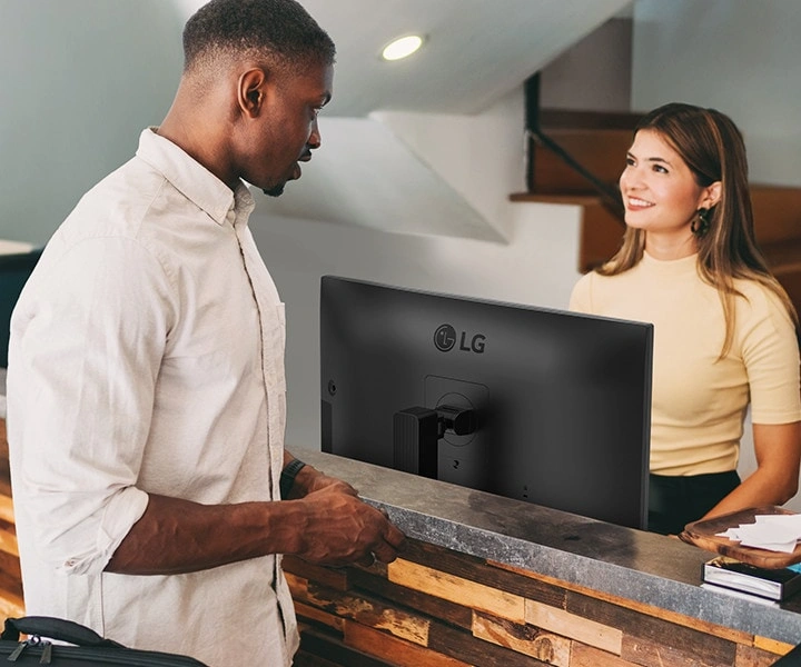 Ergonomic stand adjustment at a reception desk